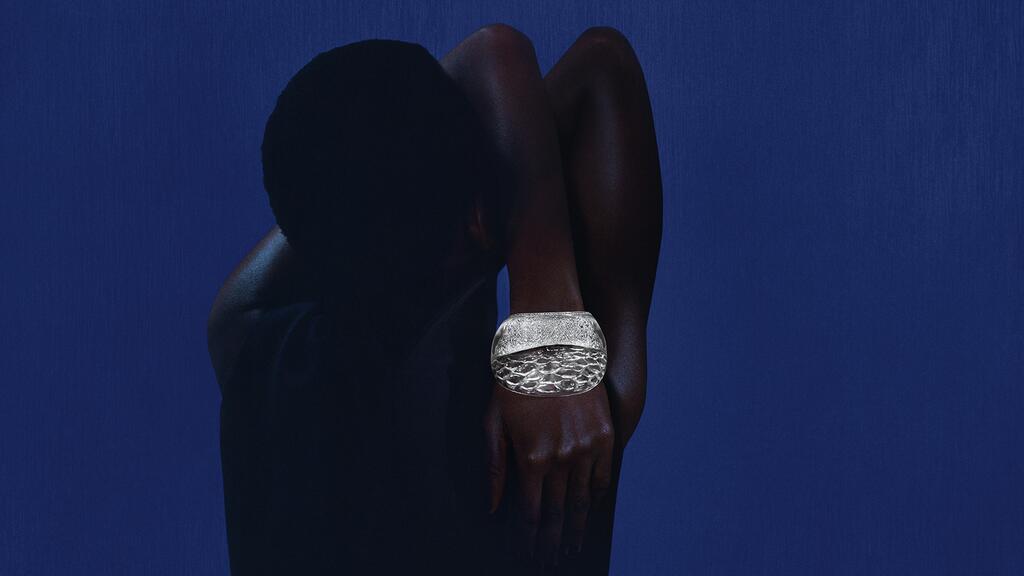 The “Ciel De Glace” bracelet made from rock crystal with pavé diamonds and blue sapphires set in 18-karat white gold Ciel De Glace Bracelet